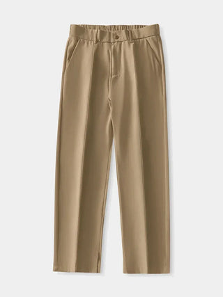 Flexible stretch flex pants with utility-style cargo pockets and breathable athleisure comfort in earthy neutral tones.