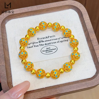 The same style as gold shop 24K real gold enamel hollow filament round bead bracelet au999 gold bracelet retro fashion