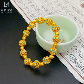 The same style as gold shop 24K real gold enamel hollow filament round bead bracelet au999 gold bracelet retro fashion